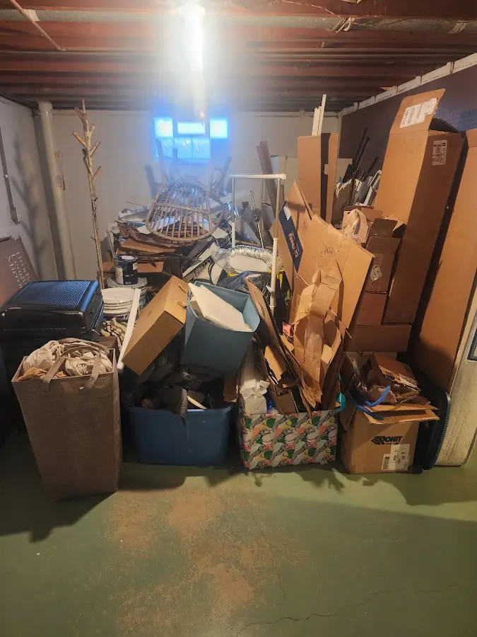 Roll-off dumpster container at job site for Concrete Dumpster Rental in Onalaska